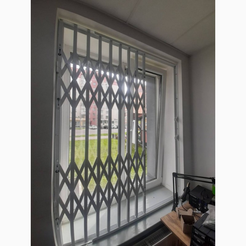 Фото 6. Раздвижные решетки металлические на окна двери, витpины. Производство устанoвка пo Украине